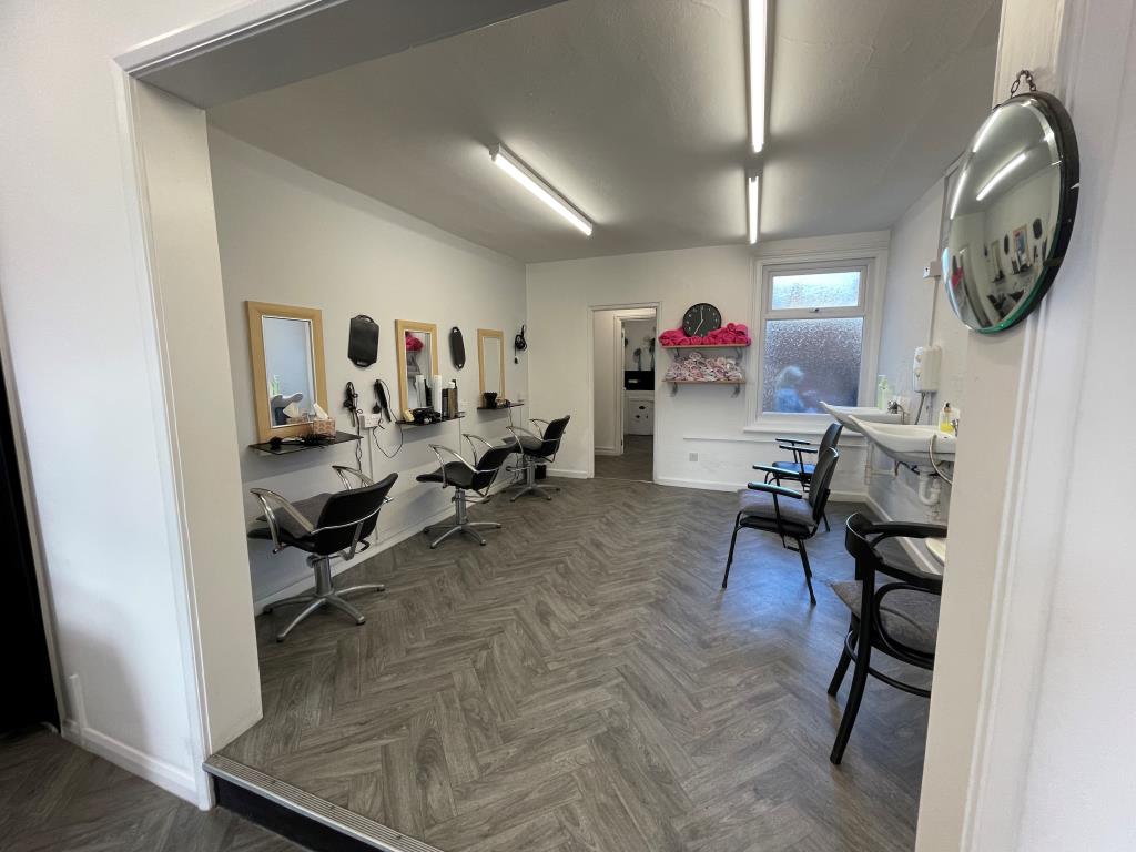Lot: 111 - FREEHOLD SHOP AND TWO-BEDROOM FLAT - Ground floor rear area